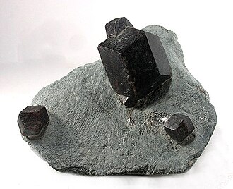 Almandine specimen: deep red and reddish brown mineral