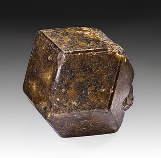 Andradite specimen: yellow-green (demantoid) and brown mineral