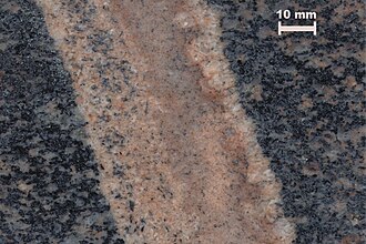 Aplite specimen: white and pink igneous rock