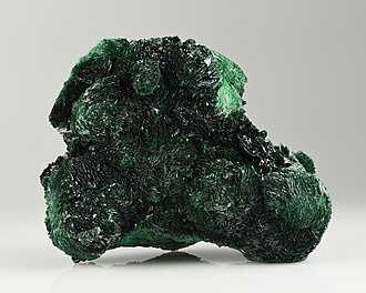 Atacamite specimen: bright green and dark green mineral