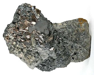 Bismuth specimen: silvery white and pinkish iridescent tarnish (yellow, red, blue hues) mineral