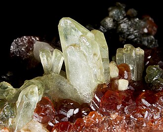 Diopside specimen: light to dark green and white mineral