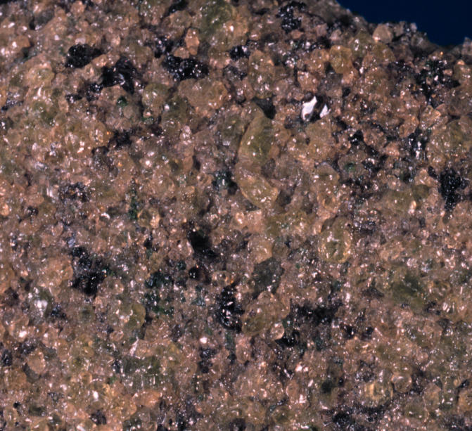 Dunite specimen Dunite specimen: olive green and yellowish green igneous rock