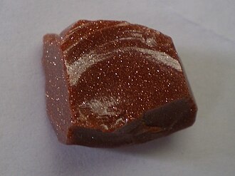 Goldstone specimen: copper and brown material