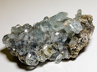 Goshenite specimen: colorless and white mineral