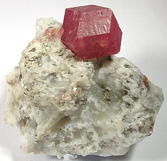Grossular specimen: colorless and green mineral