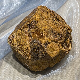 Hessonite specimen: orange-brown and cinnamon mineral