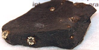 Hornfels specimen: gray and black metamorphic rock