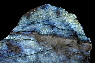 Labradorite specimen: gray and blue flash mineral