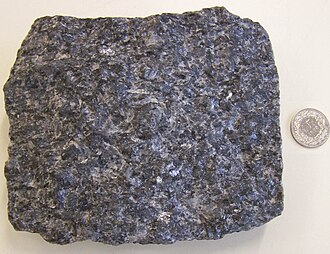 Larvikite specimen: dark gray and blue gray igneous rock