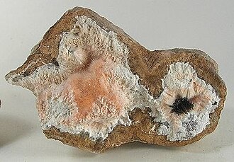 Natrolite specimen: colorless and white mineral