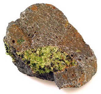 Olivine specimen: olive green and yellowish green mineral