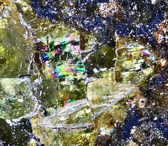 Peridot specimen: yellow-green and olive green gemstone