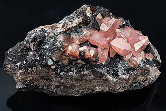 Rhodochrosite specimen: pink and rose red mineral