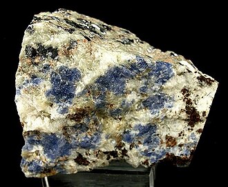 Sodalite specimen: blue and blue with white veins mineral