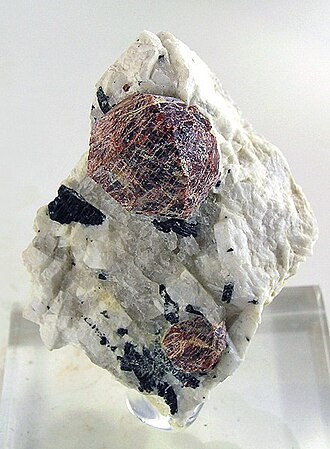 Spessartine specimen: orange and red mineral