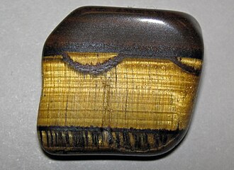 Tiger's Eye specimen: golden brown and yellow mineral