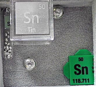 Tin specimen: silver and gray metal