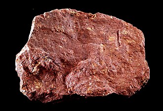 Trachyte specimen: light gray and tan igneous rock